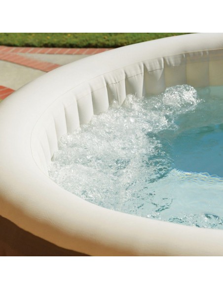 Spa insuflável Intex fabricado com a tecnologia FiberTech e PVC. Sistema de bolhas produzidas por 140 saídas de ar à pressão. In